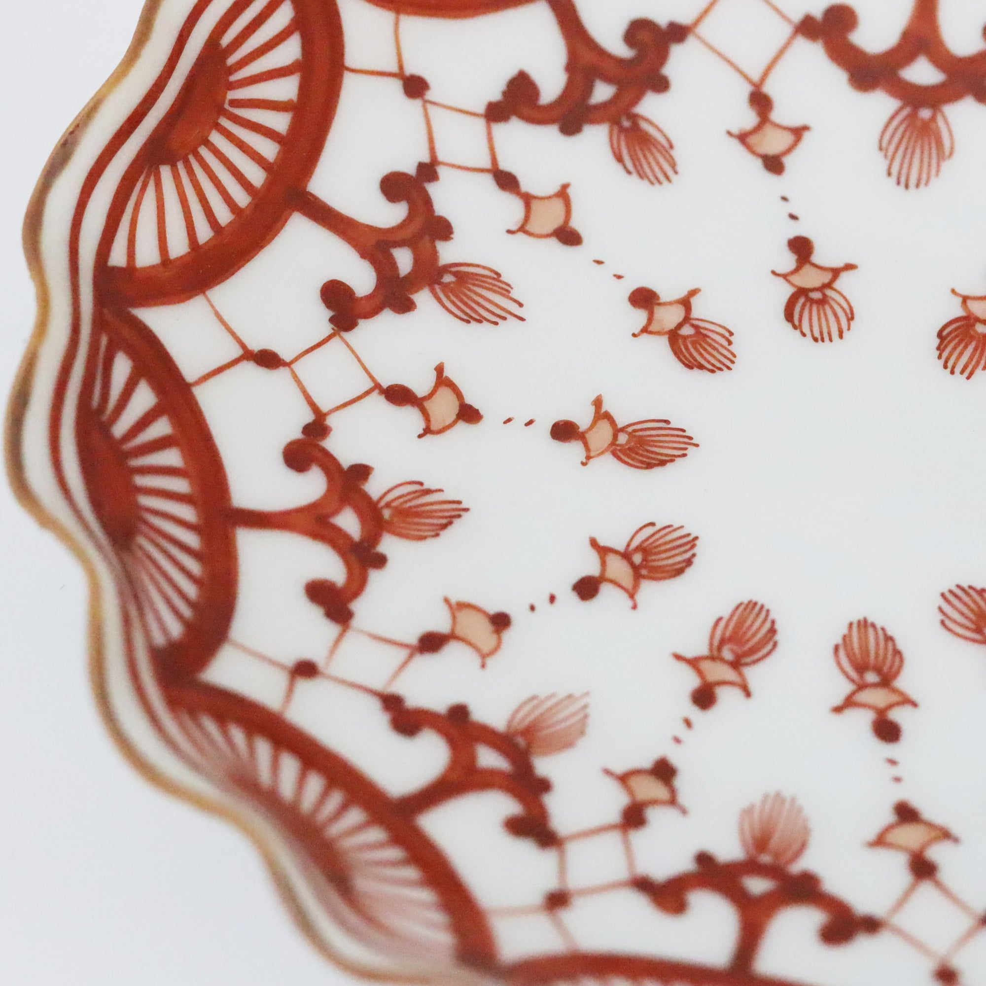 4-inch plate with brocade pattern and wave pattern