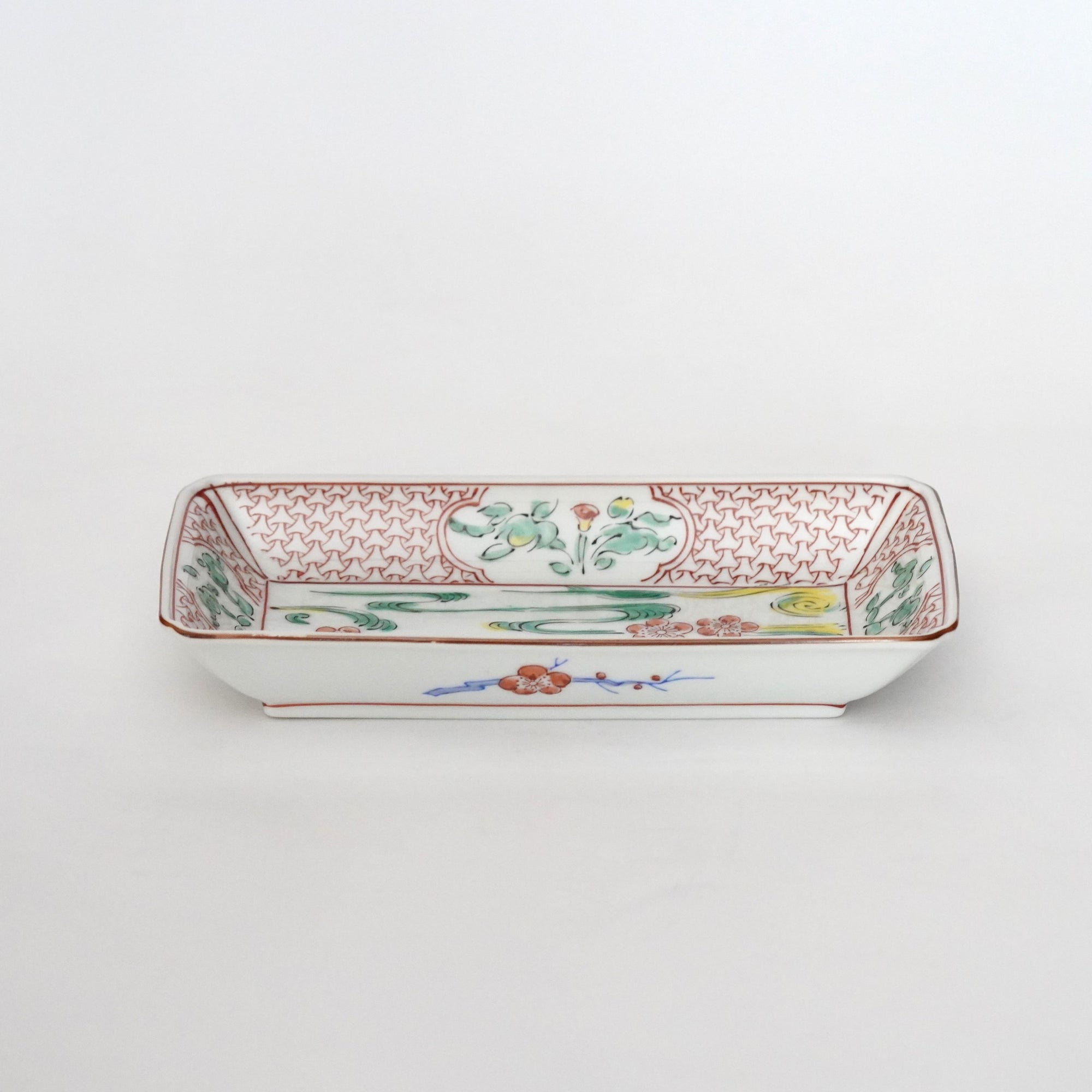 Long square plate with red plum blossoms and flowing water
