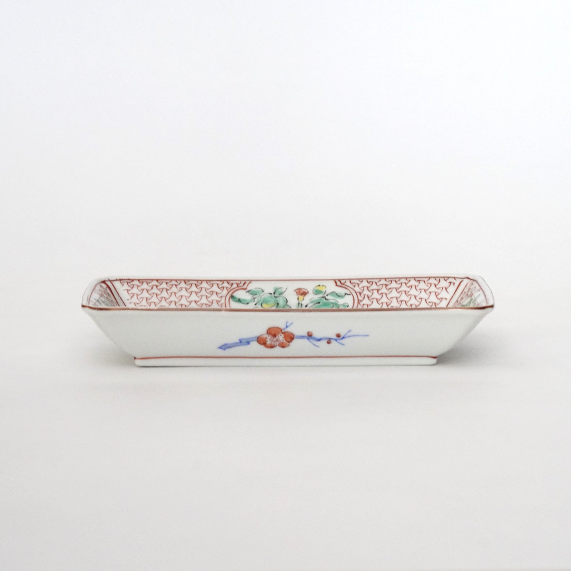 Long square plate with red plum blossoms and flowing water