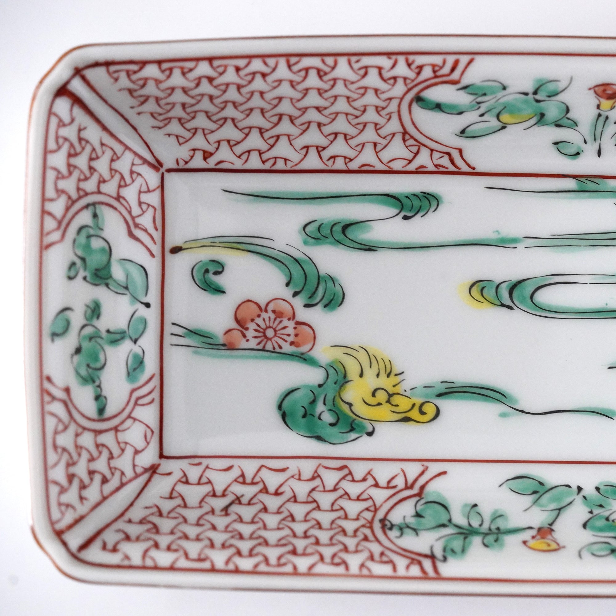 Long square plate with red plum blossoms and flowing water