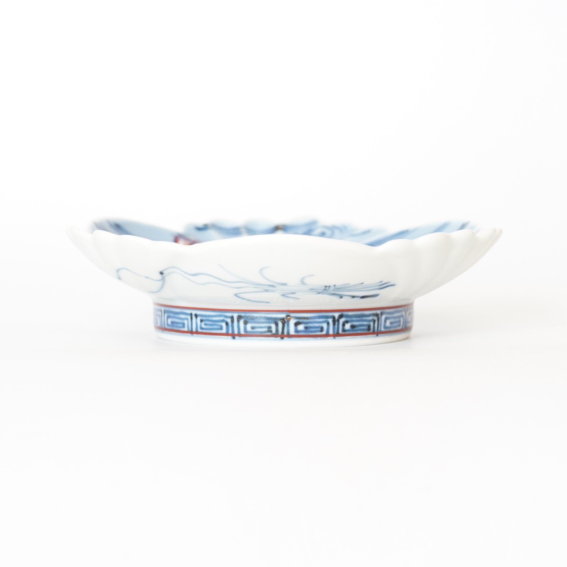 5-inch plate with ink-filled treasures and flowers and birds pattern