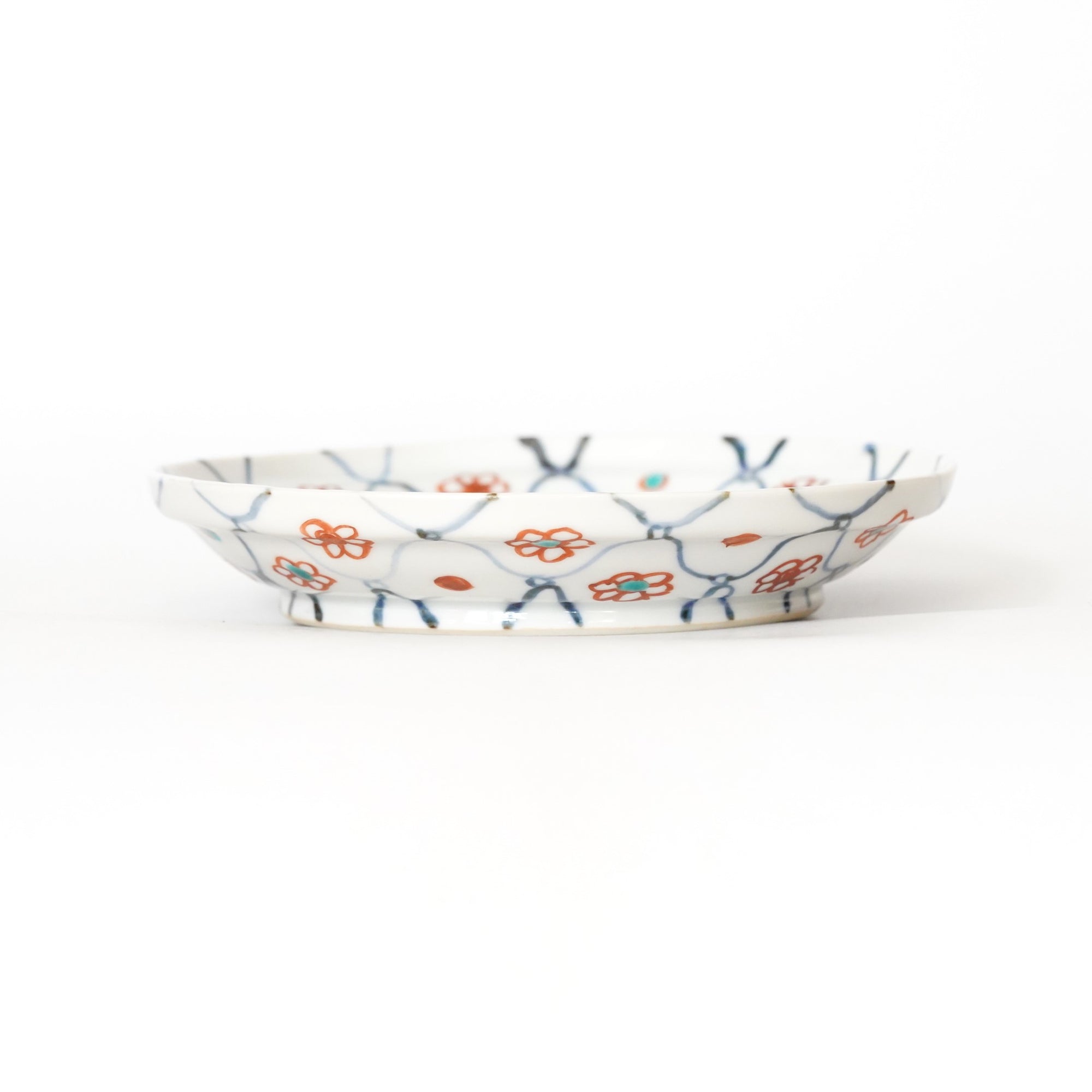 square flower patterned diamond-shaped plate