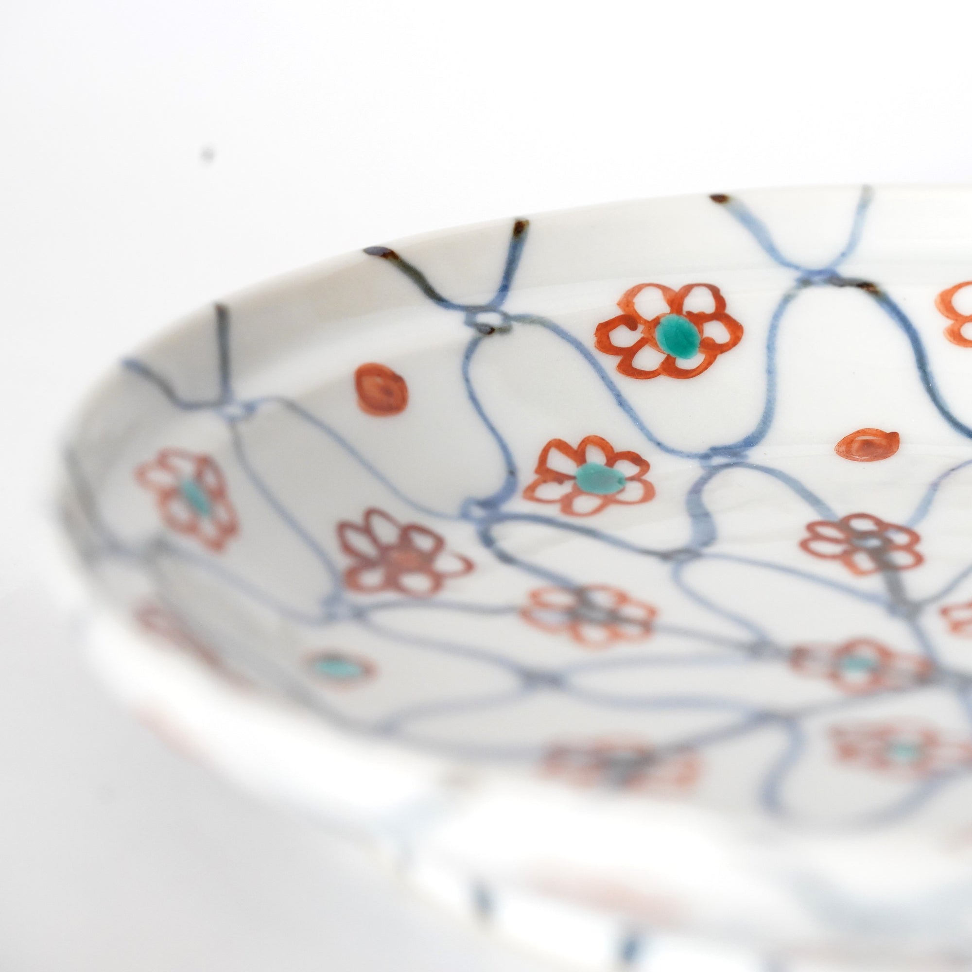 square flower patterned diamond-shaped plate