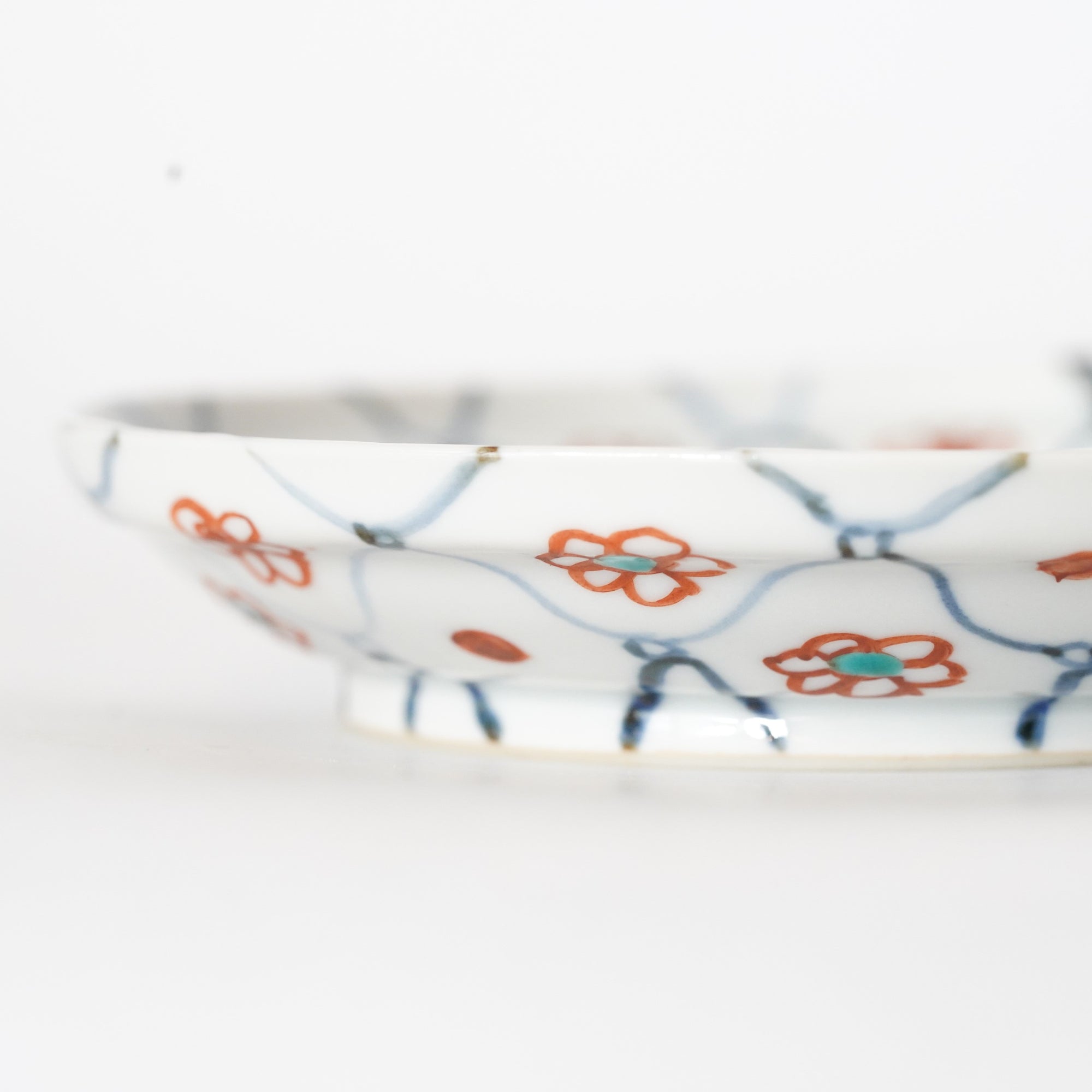 square flower patterned diamond-shaped plate