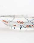 square flower patterned diamond-shaped plate