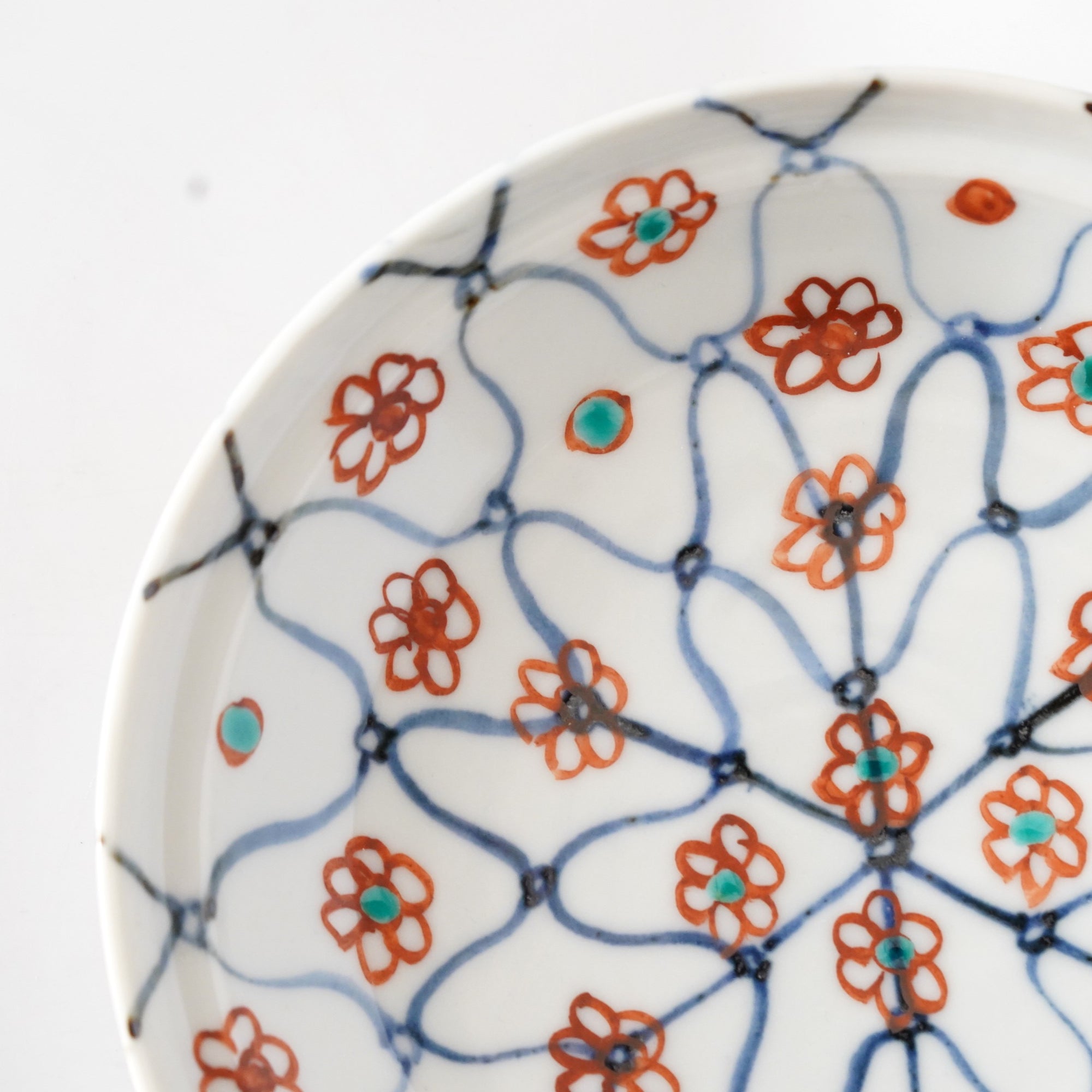 square flower patterned diamond-shaped plate