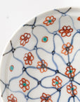 square flower patterned diamond-shaped plate