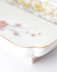 5-inch plate with ink-filled treasures and flowers and birds pattern
