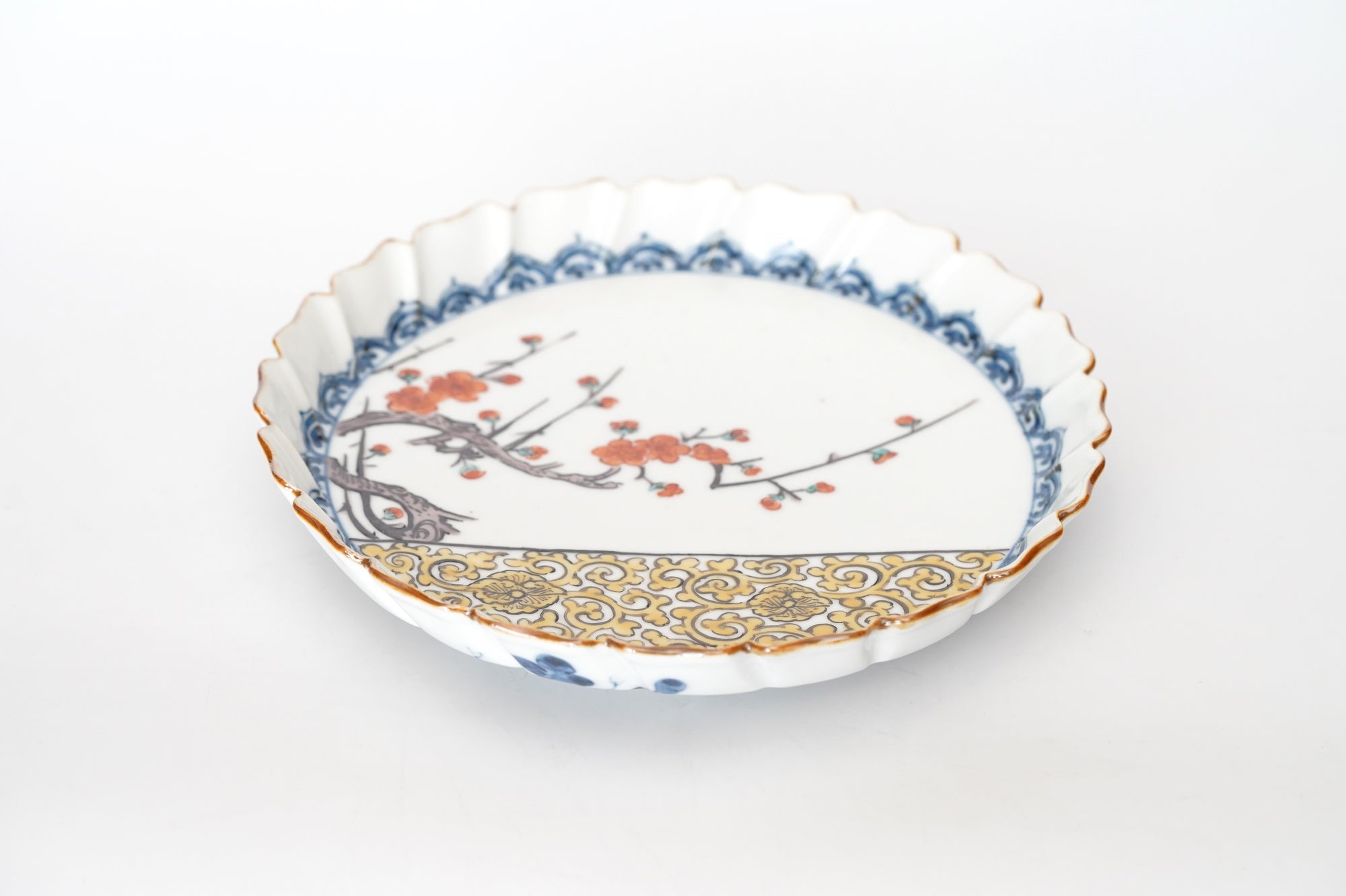 5-inch plate with ink-filled treasures and flowers and birds pattern