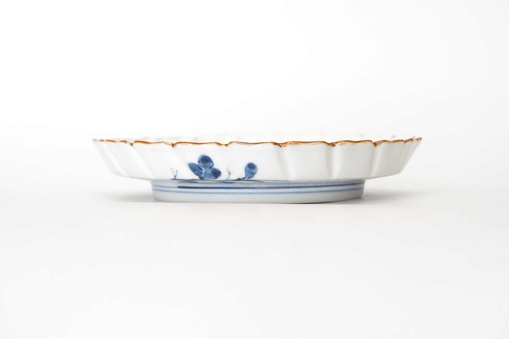5-inch plate with ink-filled treasures and flowers and birds pattern