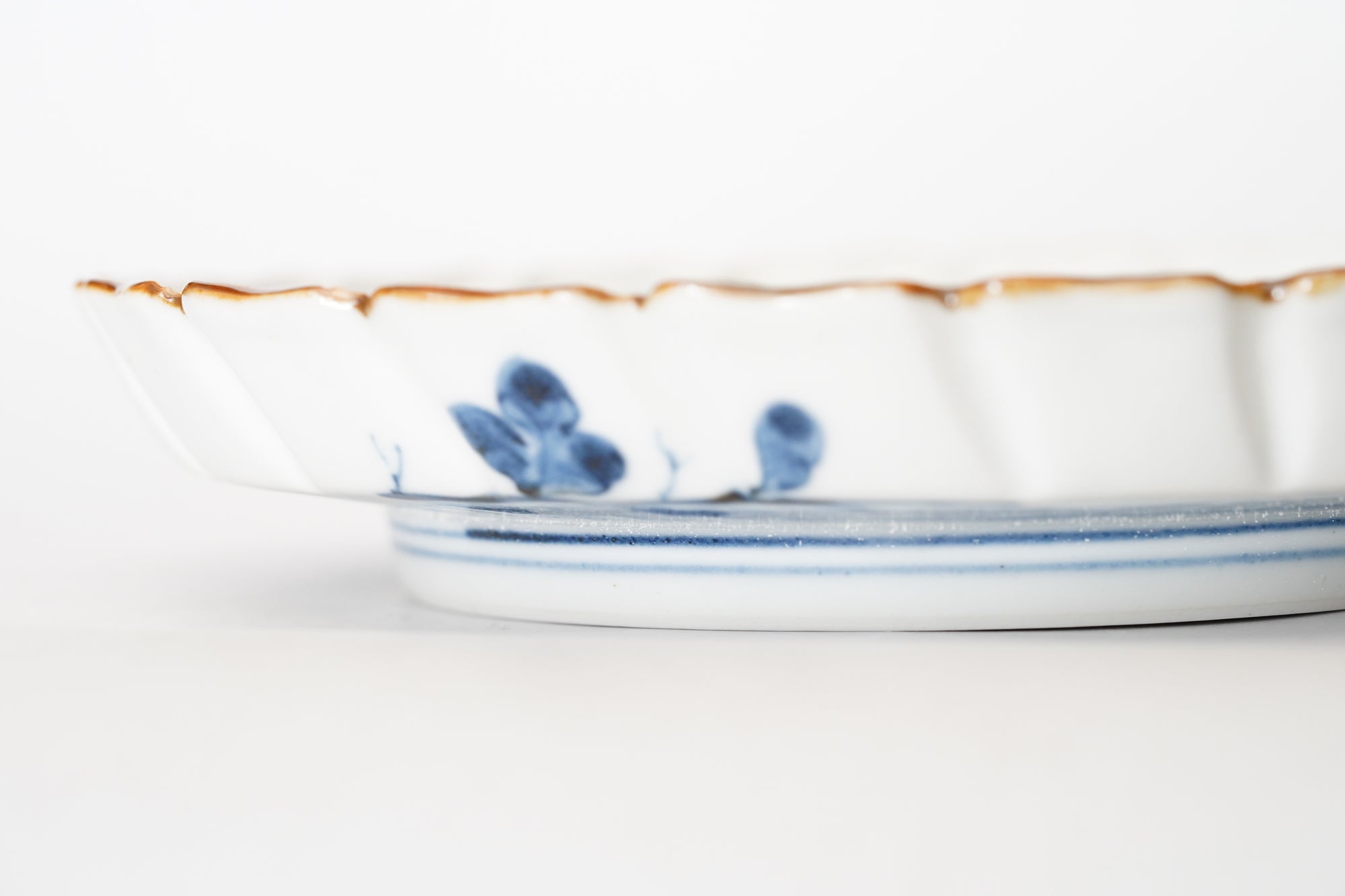 5-inch plate with ink-filled treasures and flowers and birds pattern
