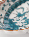5-inch plate with ink-filled treasures and flowers and birds pattern