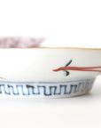 5-inch plate with ink-filled treasures and flowers and birds pattern