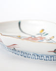 5-inch plate with ink-filled treasures and flowers and birds pattern