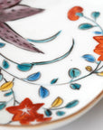 5-inch plate with ink-filled treasures and flowers and birds pattern