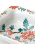 square flower patterned diamond-shaped plate