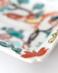 square flower patterned diamond-shaped plate