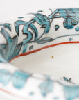 5-inch plate with ink-filled treasures and flowers and birds pattern