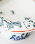 5-inch plate with ink-filled treasures and flowers and birds pattern