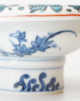 5-inch plate with ink-filled treasures and flowers and birds pattern
