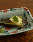 square flower patterned diamond-shaped plate