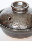 Black 4 inch handmade small pot rough carving
