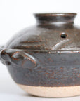 Black 4 inch handmade small pot rough carving