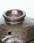 Black 4 inch handmade small pot rough carving