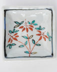square flower patterned diamond-shaped plate