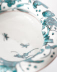 5-inch plate with ink-filled treasures and flowers and birds pattern