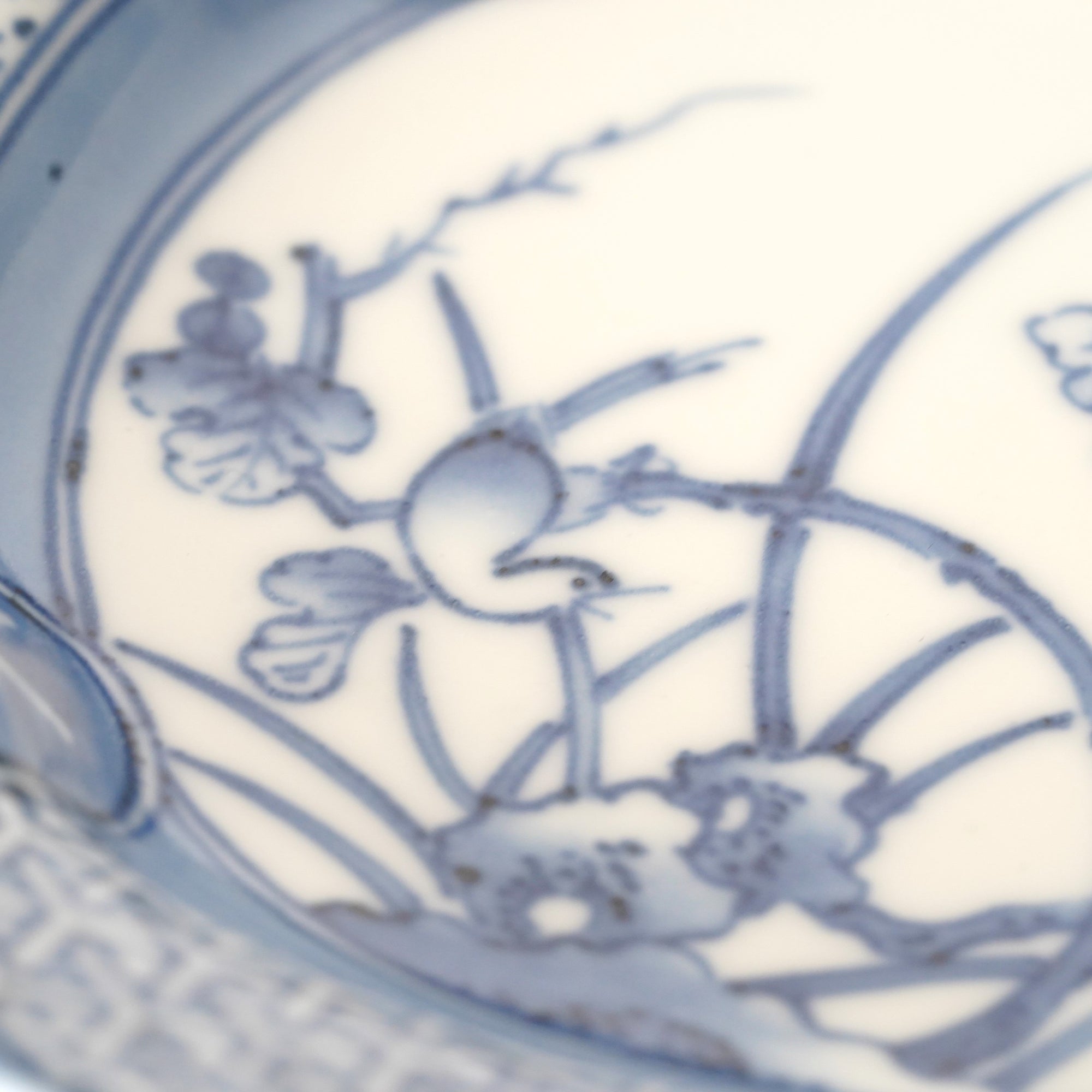 5-inch plate with ink-filled treasures and flowers and birds pattern