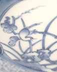 5-inch plate with ink-filled treasures and flowers and birds pattern