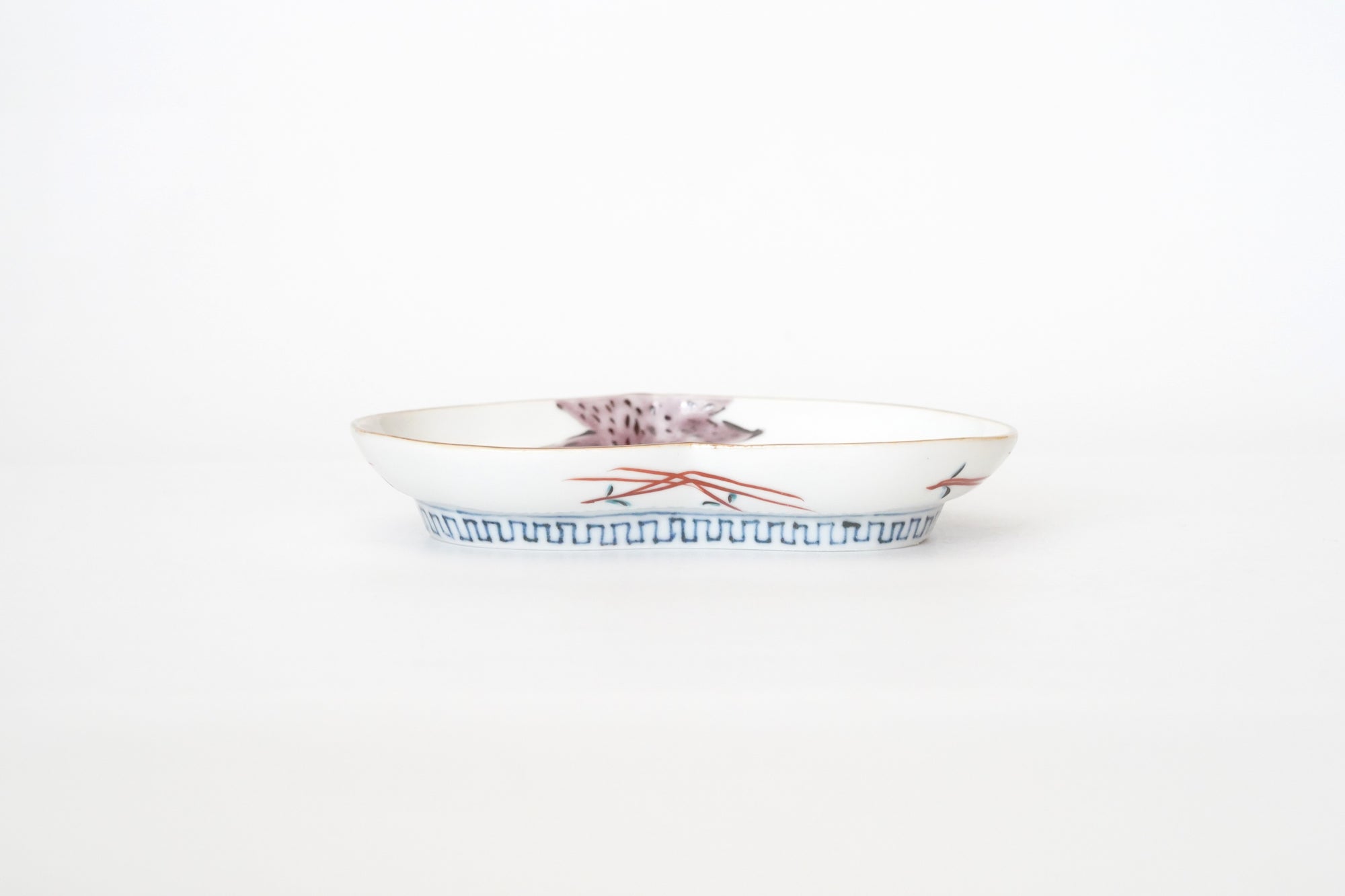5-inch plate with ink-filled treasures and flowers and birds pattern