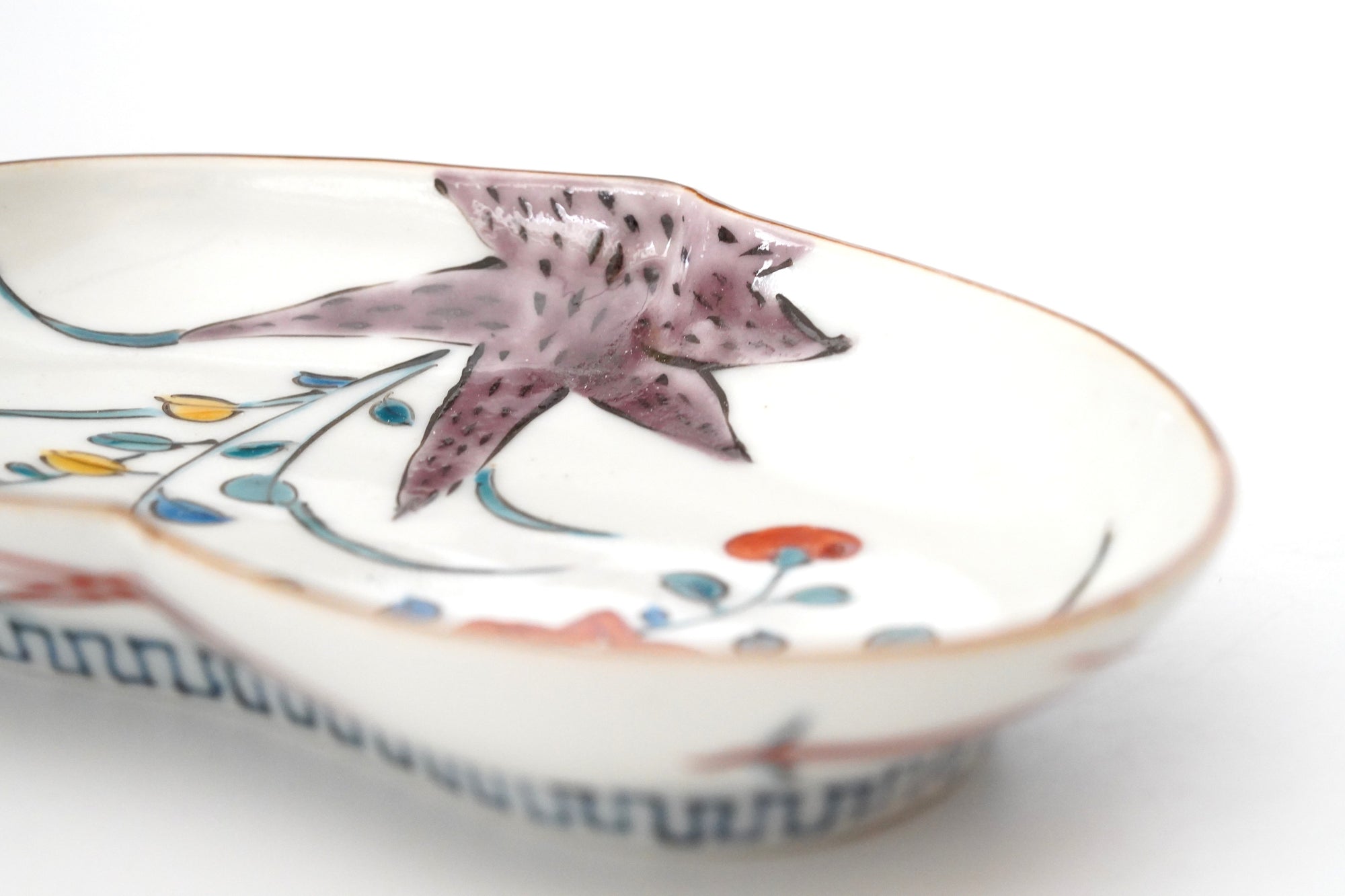 5-inch plate with ink-filled treasures and flowers and birds pattern