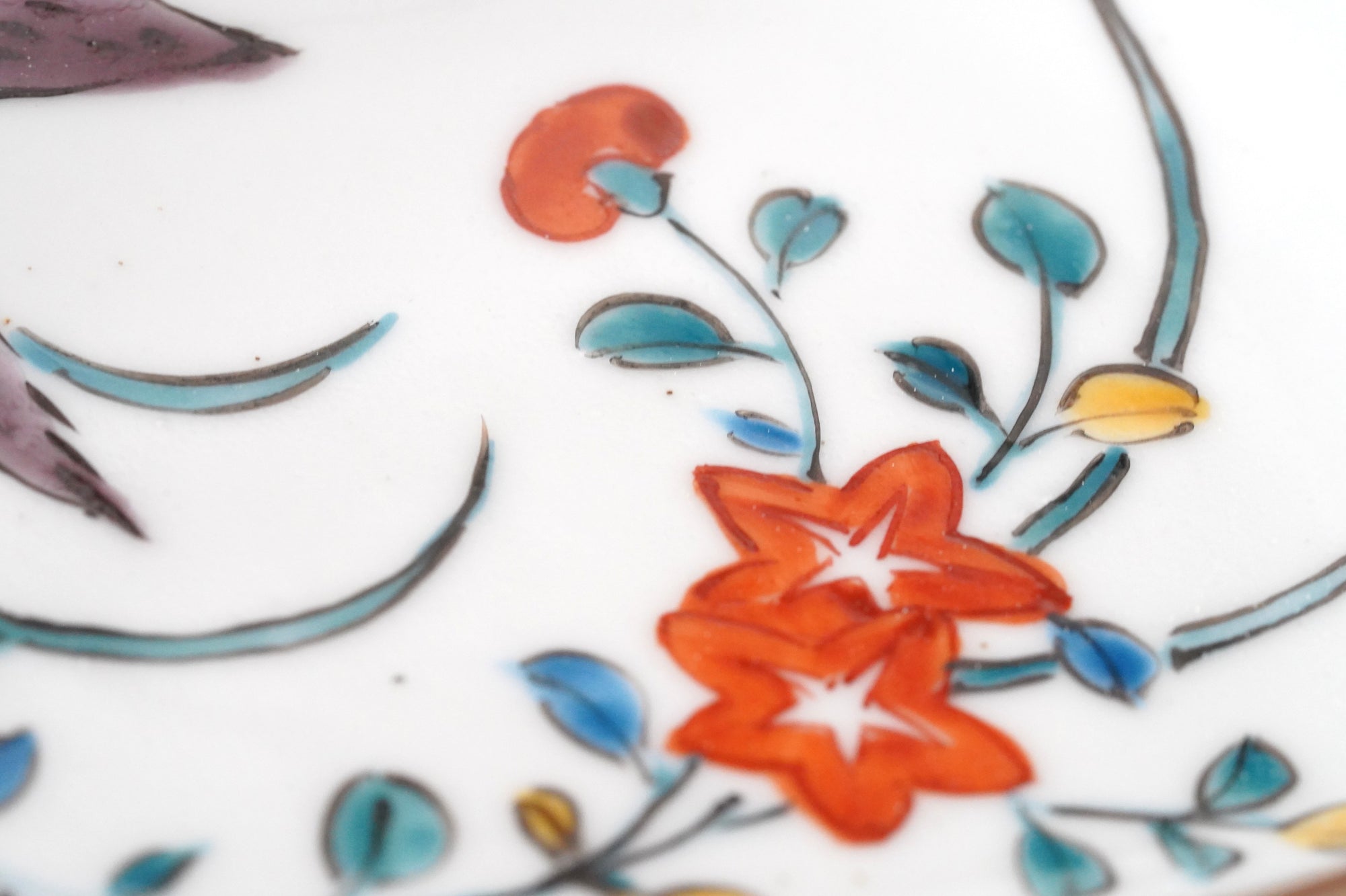 5-inch plate with ink-filled treasures and flowers and birds pattern
