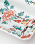 square flower patterned diamond-shaped plate