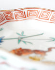 5-inch plate with ink-filled treasures and flowers and birds pattern