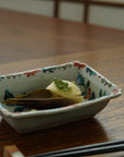 square flower patterned diamond-shaped plate