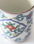 Colored flower and bird teacup